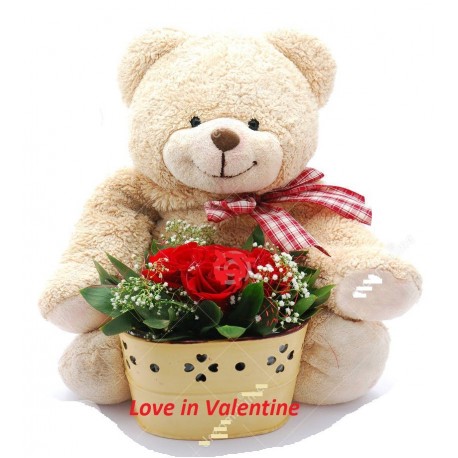 Valentine rose flower with teddy bear in basket