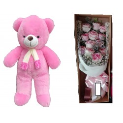 The  teddy bear size 1.20 meter with flowers in box